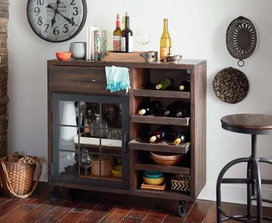 Wooden bar cabinet with wine and glassware.