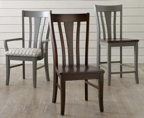 Three wooden chairs with slatted backs