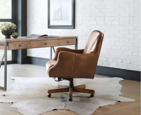 Modern office desk with brown leather chair