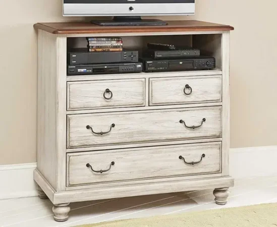 Vintage white dresser with TV and electronics